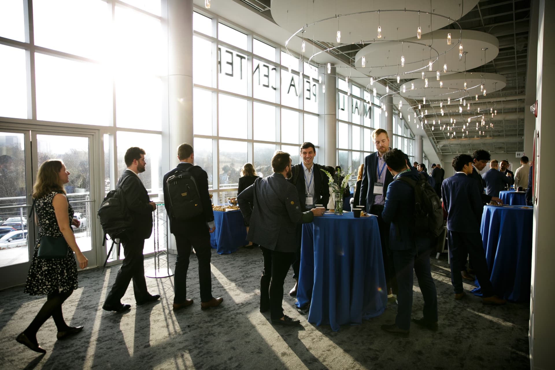 Attendees connecting at a Frontiers Summit reception